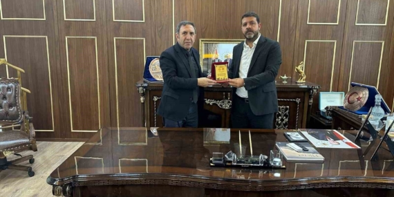 Aile ve Sosyal Politikalar İl Müdürü Polat’tan iş adamı Bozkuş’a teşekkür plaketi